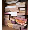 Large box full of board cut-offs. Scrap boards, and lumber