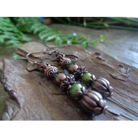 Small antique copper drops with crystal in green and copper on small attractive hooks. Beautiful romantic earrings in copper