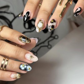 Stereoscopic Dark Totem Press on Nails Almond Fake Nails, LPOODDNU Black Gold Press on Nails Medium Length False Nail Tips with Star Designs Full Cover Glue on Nails for Women Nail Art Decorations