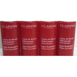 CLARINS SUPER RESTORATIVE WAKE-UP LOTION 1 OZ - LOT OF 4