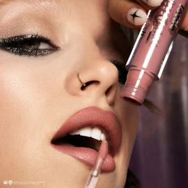 Lottie London Transforming Liquid Lipstick in Wanted, Transforming liquid lipstick with a metallic glitter finish in a nude pink shade