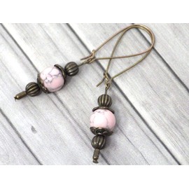 Vintage-style Thurcolas earrings in reconstituted pink turquoise mounted on fancy hoops in antique bronze