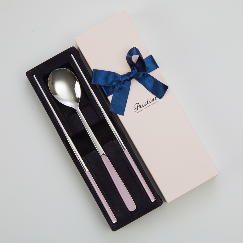 Pristine pastel-colored, premium, high-quality domestic cutlery set with good grip,