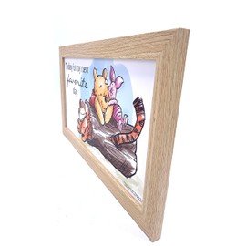 Silver Buffalo Disney’s Winnie the Pooh and Friends Gel Coat 10" x 18" Framed MDF Wall Art – Winnie the Pooh Inspirational quote “Today is my new favorite day”.