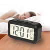 RCA Portable Alarm Clock with Auto Night Light Sensor, Adjustable