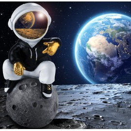 BRUBAKER Decorative Astronaut Sitting on the Moon in Cool Pose - 24 cm Spaceman Space Figure with Chrome-plated Helmet and Black Hoodie - Hand-Painted Statue - Gold, Black and White