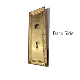 Refined antique style door trim escutcheon plate in the Polished Brass Finish