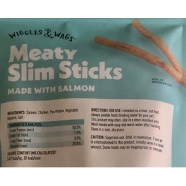 Wiggles & Wags Meaty Slim Sticks Made with Salmon Dog Treats. One Six Ounce Bag. One Biggs Dog Waste Roll.