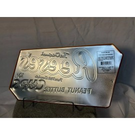 Ande Rooney embossed sign of  @ CLASSIC REESES PEANUT BUTTER CUPS @ 10 CENTS