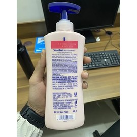 Vaseline- Loción diaria saludable | Con triple protección solar y vitamina B3 | Loción corporal | 400 ml (13,52 onzas líquidas)