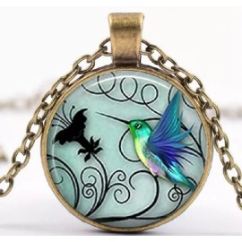 Unbranded A Round capsule with Art of a Hummingbird with background in Silver