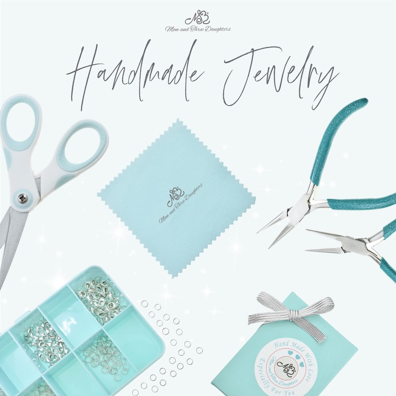 Mom and Baby Otter Necklace In Sterling Silver on an