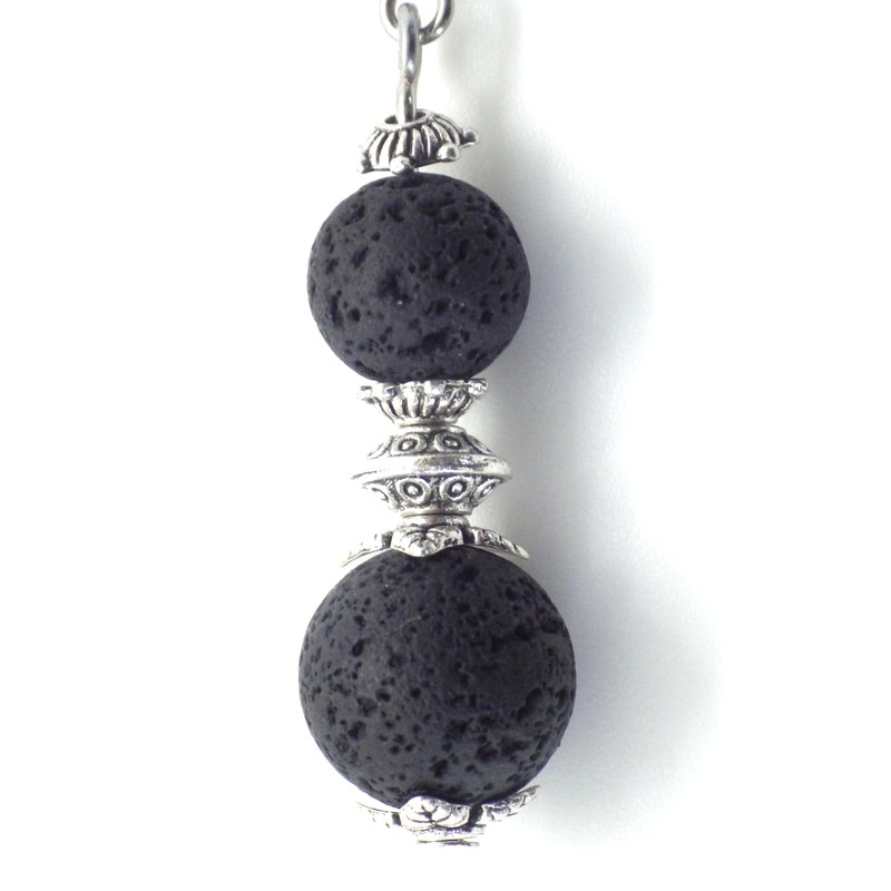 Ohrringe aus Edelstahl mit schwarzen Lavasteinperlen und silbernen Messingperlen