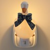 Kittmip Goose Bow Shaped Resin Night Light Plug in Dusk