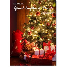 doodlecards Granddaughter and Fiance Christmas Card Teddy by Christmas Tree Medium Size Christmas Card for Granddaughter & Fiance with Plain Envelope