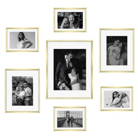 Frametory, Gold Aluminum Picture Frame with Removable Mat - Set of 7 Includes Four 5x7, Two 8x10, One 11x14 - Real Glass Front - Simple Gallery Wall Frames for Art Prints and Posters
