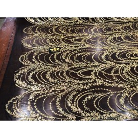 NEW CREATIONS FABRIC AND FOAM INC GOLD SHINY GLITTER WAVE DESIGN ON A BLACK MESH-PROM-SOLD BY THE YARD.