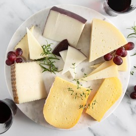 Spanish Cheese Assortment - Black Edition – Truffle Cheese, Black Garlic Cheese, Mahon, Idiazabal + Free 2 oz Iberico Ham by Fermin – 2 Lbs Total – Carmen & Lola Eat España!
