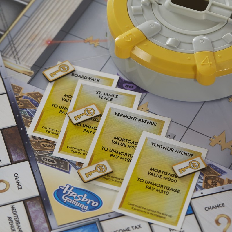 MONOPOLY Secret Vault Board Game for Kids Ages 8 and