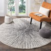SAFAVIEH Evoke Collection EVK228K Abstract Burst Non-Shedding Dining Room Entryway Foyer Living Room Bedroom Area Rug, 6'7" x 6'7" Round, Black / Ivory
