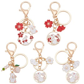 DELORIGIN 5pcs Enamel Rabbit Keychains, Flower Bunny Keychains with Sakura Cloud Charms Cute Easter Bunny Charms Animal Keychains for Women Handbags Party Decors Earphone Case Car Key