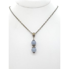 Women's necklace with blue quartz bead pendant and antique bronze Tibetan beads