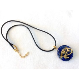 Orgone pendant necklace with golden Eye of Horus and Lapis Lazuli stones. Egyptian amulet 1.38 inch diameter. Made in USA