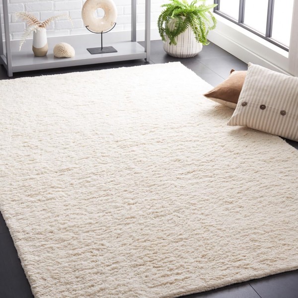 SAFAVIEH Casablanca Collection Area Rug - 6' x 9', Ivory,