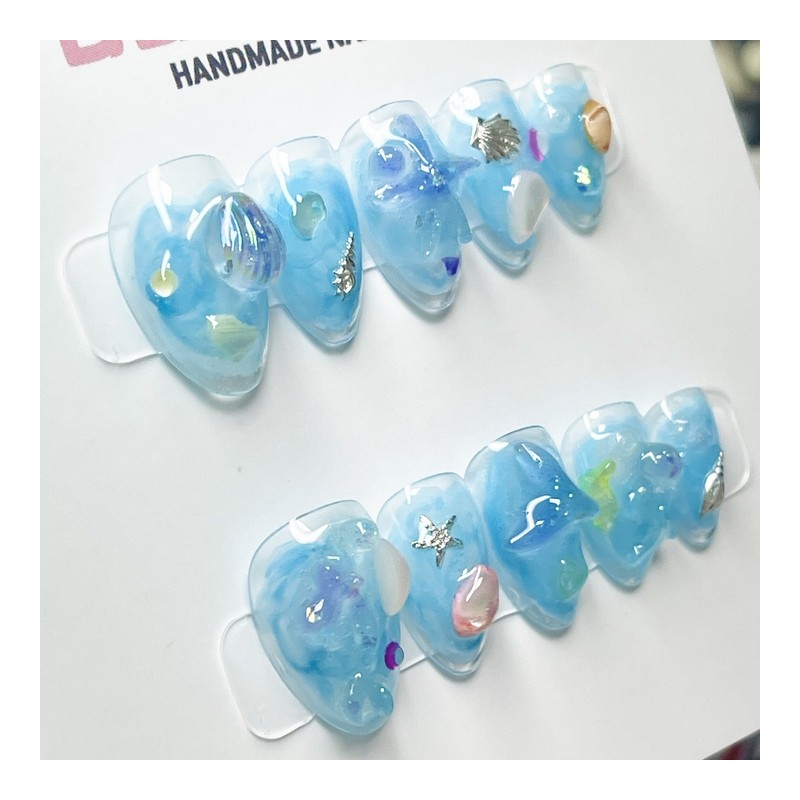 Handmade nail tips in the underwater world - Stelletto /