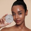 Base de maquillaje en formato compacto Gleaming Tension Cushion de