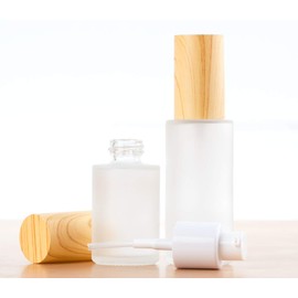 3 Pcs 30ml 1oz Travel Size Leakproof Pump Bottles Refillable Glass Lotion Dispenser Bottles Cosmetic Toiletries Containers Travel Size Cosmetic Cream Pump Bottles for Flight Holiday(Wood Grain Lid)