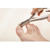 Nipper-type nail clippers for winding nails