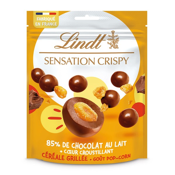 Lindt - Sachet de billes Céréale Grillée SENSATION CRISPY - Chocolat au Lait Goût Pop-Corn, 140g