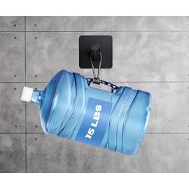 AESTHELIV Ganchos adhesivos resistentes para colgar, paquete de 4, ganchos de aluminio negro mate para baño y cocina para toallas, batas, tazas y más