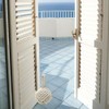 Tope de puerta, tope de puerta de exterior con peso