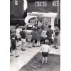 CHILDREN GETTING ICE CREAM FROM LYONS MAID ICE CREAM TRUCK