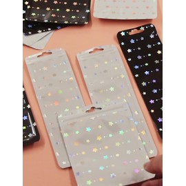 100 Pcs Ziplock Packaging Bags Clear Front Plastic Star Holographic Bag with Hang Hole Sample Bags for Food Saver Storage Package Bag for Jewelry (Black, 2.5x8.6in)