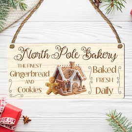 "North Pole Bakery" Christmas Plaque - Festive Gingerbread House Sign for Holiday Kitchen Decor - Indoor Christmas Decoration with Rustic Twine Hanger - Perfect for Cookie Lovers and Bakers (White)