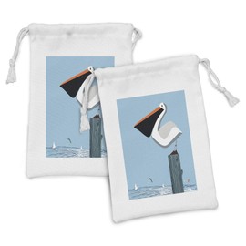 Lunarable Pelican Fabric Pouch Set of 2, Pelican Stands on a Wooden Column at the Sea Jumping Fish on Blue Sky Background, Small Drawstring Bag for Toiletries Masks and Favors, 9" x 6", Multicolor
