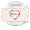 Liebestasse mit Namen Daniela und schönem Love-Motiv mit Herzen -