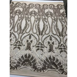 NEW CREATIONS FABRIC AND FOAM INC TAUPE DIVA DESIGN EMBROIDER SEQUINS ON A NUDE 4 WAY STRETCH MESH-SOLD BY YARD.