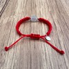 Pulsera de San Benito de Plata ley 925, roja tejida