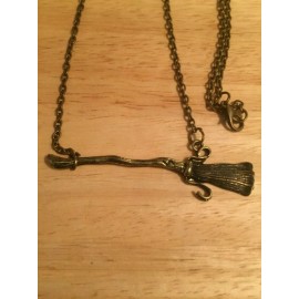 unbranded Harry's Flying Broom Necklace bronze coloring