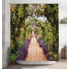 SRJ2018 Colourful summer flower garden with a path under archway