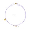 lu le | Collar fabricado con hilo con dije de