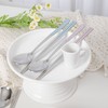 Pristine pastel-colored premium quality domestic cutlery set with good grip,