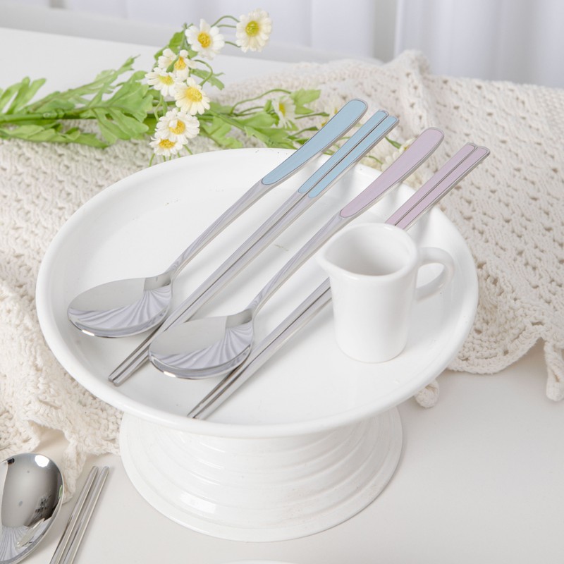 Pristine pastel-colored premium quality domestic cutlery set with good grip,