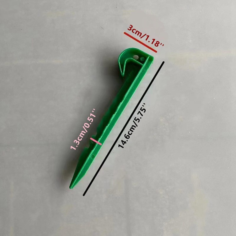 Eleutheromania Pack of 20 Plastic Tent Pegs (Green)