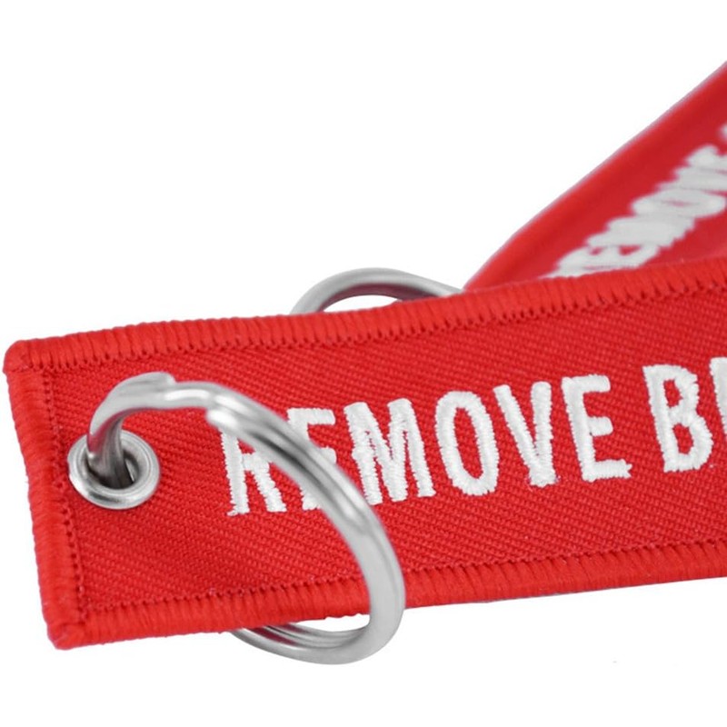 DayCount - Llavero bordado con texto en inglés"Remove before flight"