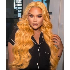 Lizzy Long Wavy Wigs for Women Middle Part Curly Wavy Wig Natural Curly Synthetic Wig Heat Resistant Fiber Wigs for Daily Party Use 26inch (Honey Blonde)